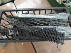 A box containing approx 70 Peco, Graham Farish and similar 00 gauge Points etc