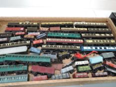 A box containing 11 00 scale Coaches, 5pc SR Electric Train and 30 Wagons