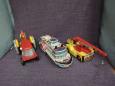 A Marx Toys Tricky Tommy plastic and tin plate Reversible Diesel Electric Toy Tractor, a Modern Toys