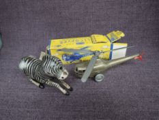 A Mettoy plastic and clockwork Helicopter GA8140, in original card box along with a tin plate and