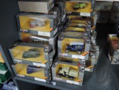 Thirty Corgi Classics diecast advertising vehicles, all in window display boxes