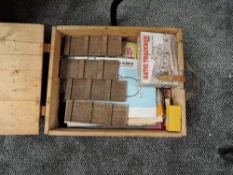 A wooden Ammo box containing 00 scale Buildings and Kits