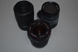 Three lenses. A Sigma 105mm 1:2,8 macro, a Sigma zoom 18-125mm 1:2,5-5,6 DC and a Vivitar Series 1