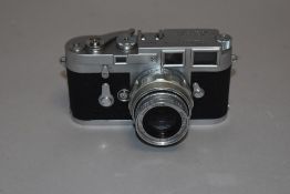 A Leica M3 camera (801576) with Elmar 90mm collapsable lens(1188783) in original case