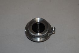 A Leica (Leitz) 2.8cm 1:6,3 lens in case, circa 1939