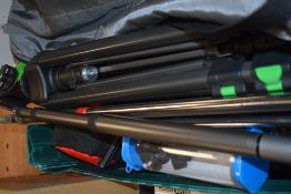 A box containing various tripod including Cullmann and Manfrodo