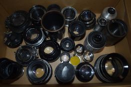 A box of approx 24 lenses including Wray, Soligar, Carl Zeiss