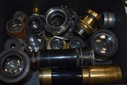 A box of Brass and metal lenses