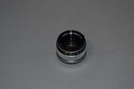 A Canon 35mm lens with Leica mount No16773