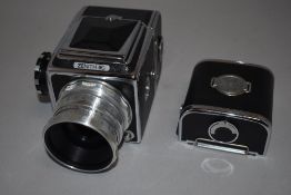 A Zenith 80 medium format camera with leather case and includes filters