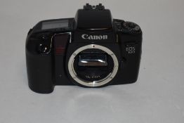 A Canon EOS 100 camera