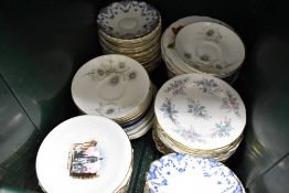 A selection of ceramic tea cup saucers and cake plates