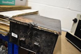 A vintage bus conductors metal storage box