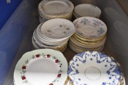 A selection of ceramic tea cup saucers and cake plates