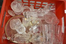 A selection of clear cut glass wares including wine glasses