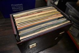 A case of vinyl records mostly classical etc