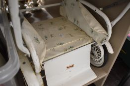 A vintage part pram by Triang