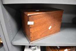 An early 20th century mahogany box, with hinged lid