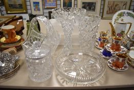 A collection of cut glass fruit bowls,vases and a basket.