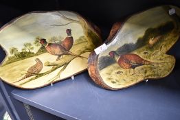 Two hand-painted transverse wood sections, decorated with pheasants in naturalistic settings, signed