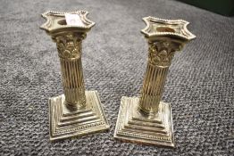 A pair of Mappin & Webb 'Princes Plate' Corinthian column candlesticks, with fluted and reeded stems