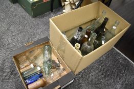 A selection of mixed vintage/antique glass and stoneware bottles, to include Thomson & Sons,
