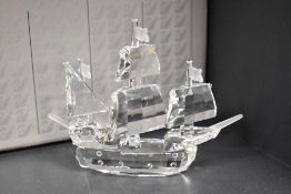 A crystal glass Swarovski figure study of the Santa Marie galleon with box