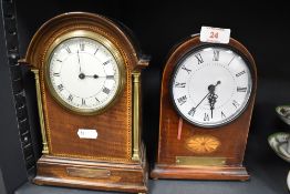 An early 20th century inlaid mahogany mantel clock with brass pillars, Arabic hours and applied