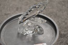 A crystal glass Swarovski figure study of a Whale group ' Care for Me' with case
