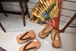 An interesting pair of Japanese Geta sandles, with woven-grass platform, together with another