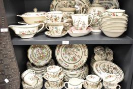 An extensive collection of Indian Tree pattern dinner and teawares, some marked for Johnson