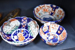 A group of three 20th century Japanese Imari porcelain bowls, of traditional design and decoration