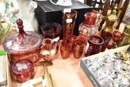 A selection if 19th century etched ruby tinted glass wares, to include lidded jar, beaker, vase,