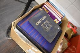 A collection of Haynes workshop manuals and vehicle information packs.