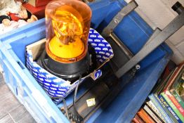 A selection of head lamps, spark plugs, magnetic orange lamp,mirrors and A vintage Dunlop foot