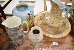 A Portuguese bird and blossom decorated baluster vase, a similar water jug, reproduction toilet