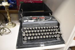 A 1930s Imperial 'The good companion model T' typewriter.