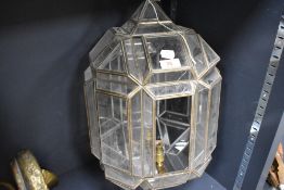An early - mid 20th century geometrically glazed pendant light fitting, some damage to glass