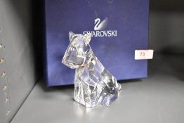 A crystal glass Swarovski figure study of a terrier dog having box
