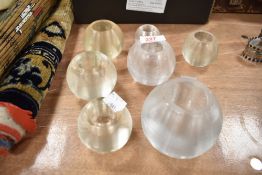 A group of seven late 19th/early 20th century ribbed glass match strikes, each of globular form