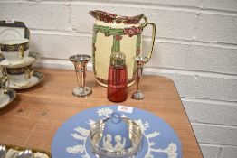 A large Royal Doulton jug having cream ground with pink flowers and green banding, A cranberry glass