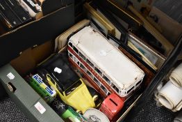 A group of model vehicles, novelty money banks and various framed car related prints