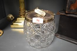 A silver plate and hobnail cut-glass biscuit barrel