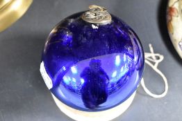 A late19th/early 20th century blown-glass cobalt blue witches ball, 9cm approx