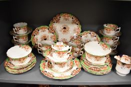 A Wellington China (J.H.C&Co Longton) teaset, transfer-printed and hand-coloured with repeating