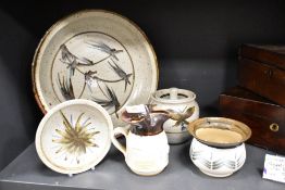 A group of Scottish Traquair studio pottery, comprising dishes, jug, lidded jar and pot