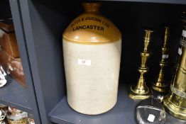 An earthen ware flagon for Yates and Jackson Ltd, Lancaster.