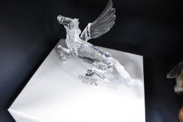 A crystal glass Swarovski figure study of a Pegasus with box
