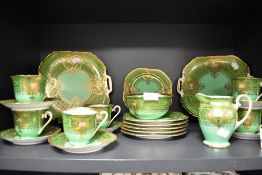 A Noritake green and gilt decorated six setting teaset, to include two side plates