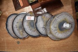 A group of six agate geode stone sample coasters